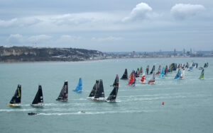 11th Hour Racing Team line up against the IMOCA 60 fleet for the start of the 2019 Transat Jacques Vabre.