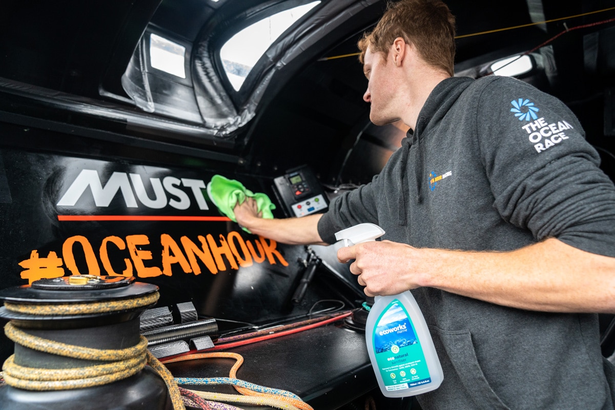 Cullen Zelenka cleans 11th Hour Racing Team IMOCA 60 with Ecoworks Marine cleaning products.