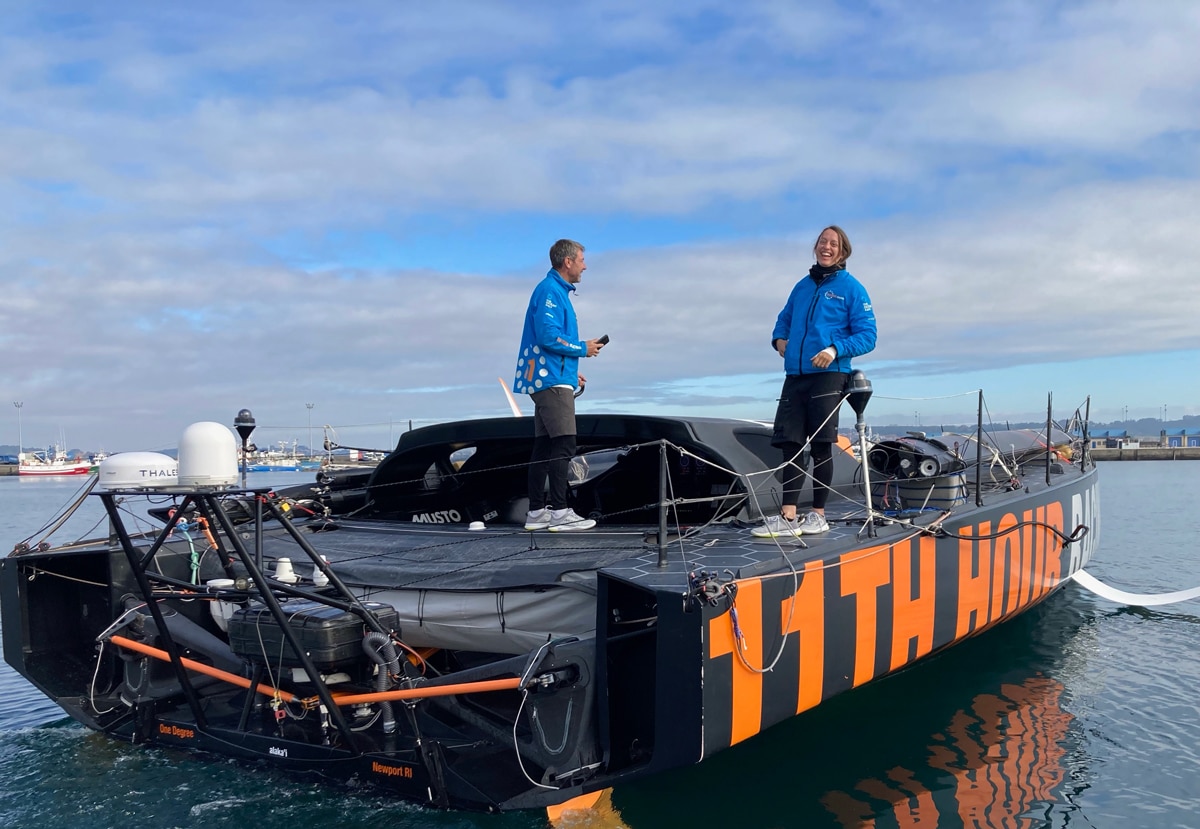 Simon Fisher and Justine Mettraux onboard Alaka'i as they depart A Coruńa for Port La Forêt France after being dismasted in the Transat JAcques Vabre.