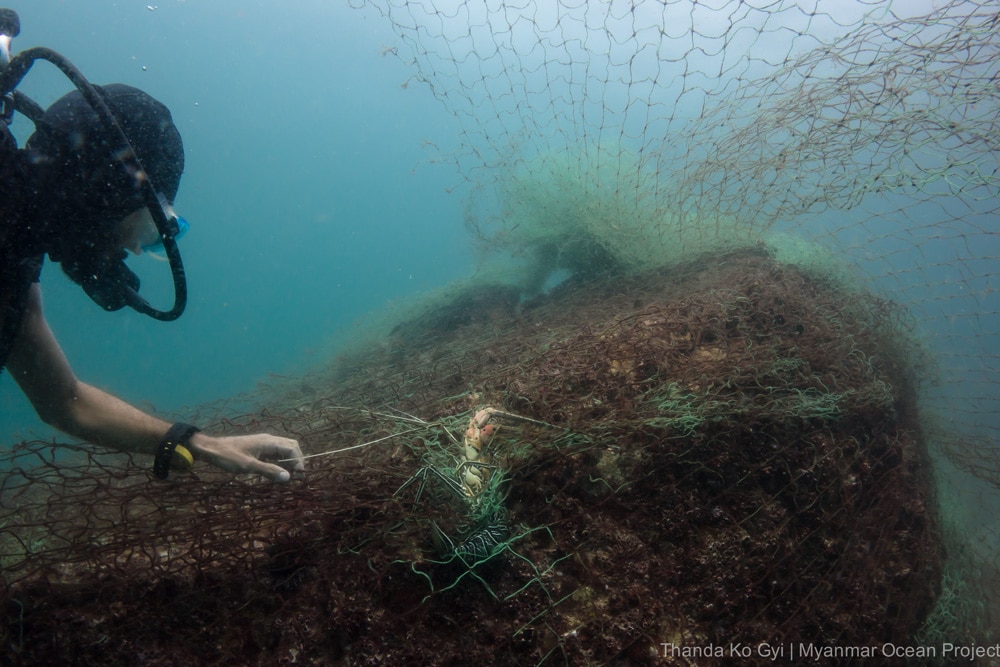 Diver In Myanmar Surveying Lost Net On A Reef Photo Credit Thanda Ko Gyi